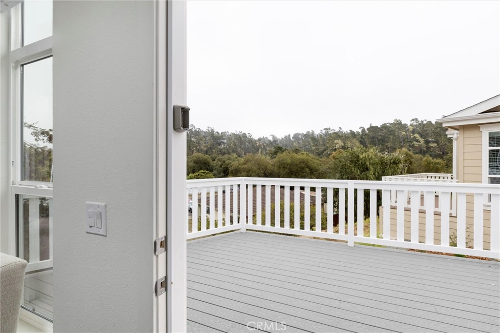 1460 Main Street, Unit 119 Cambria, CA 93428 - Photo 8 of 16 a view of a balcony with wooden floor