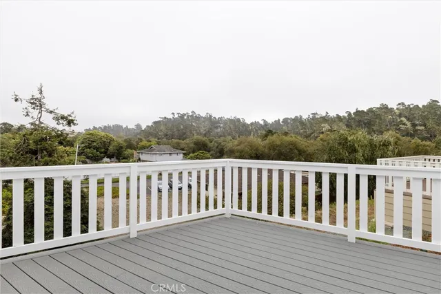 an aerial view of a house with mountain view