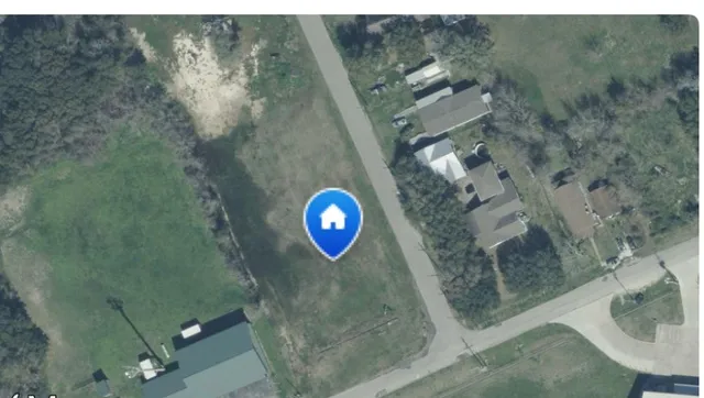 a view of an ocean and a yard