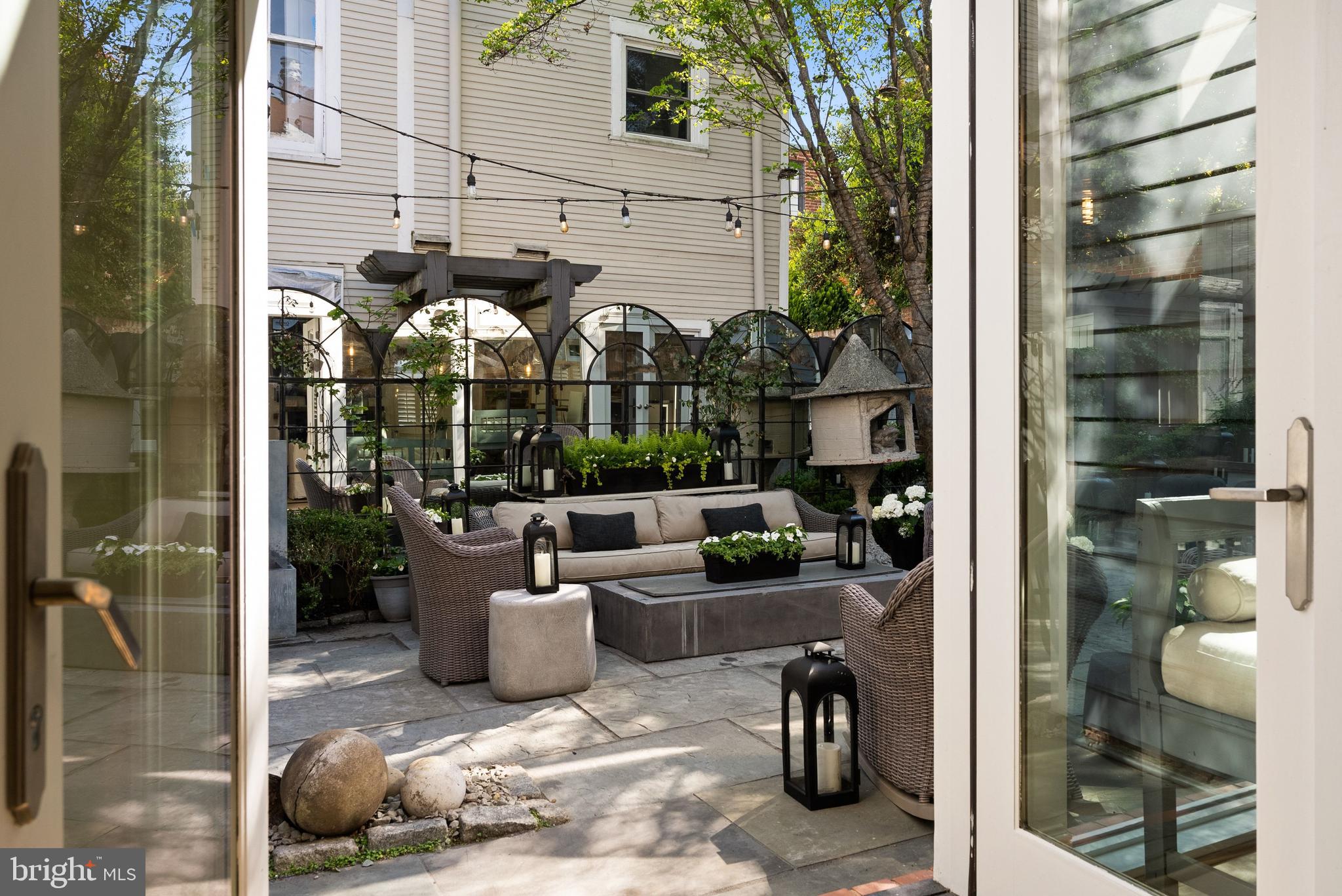 1412 28th Street Northwest Washington, DC 20007 - Photo 13 of 27 a view of a patio with couches and potted plants