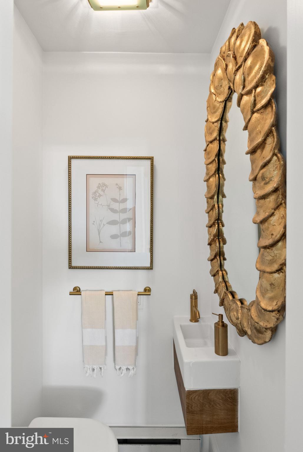 1412 28th Street Northwest Washington, DC 20007 - Photo 15 of 27 a bathroom with a bathtub and a shower