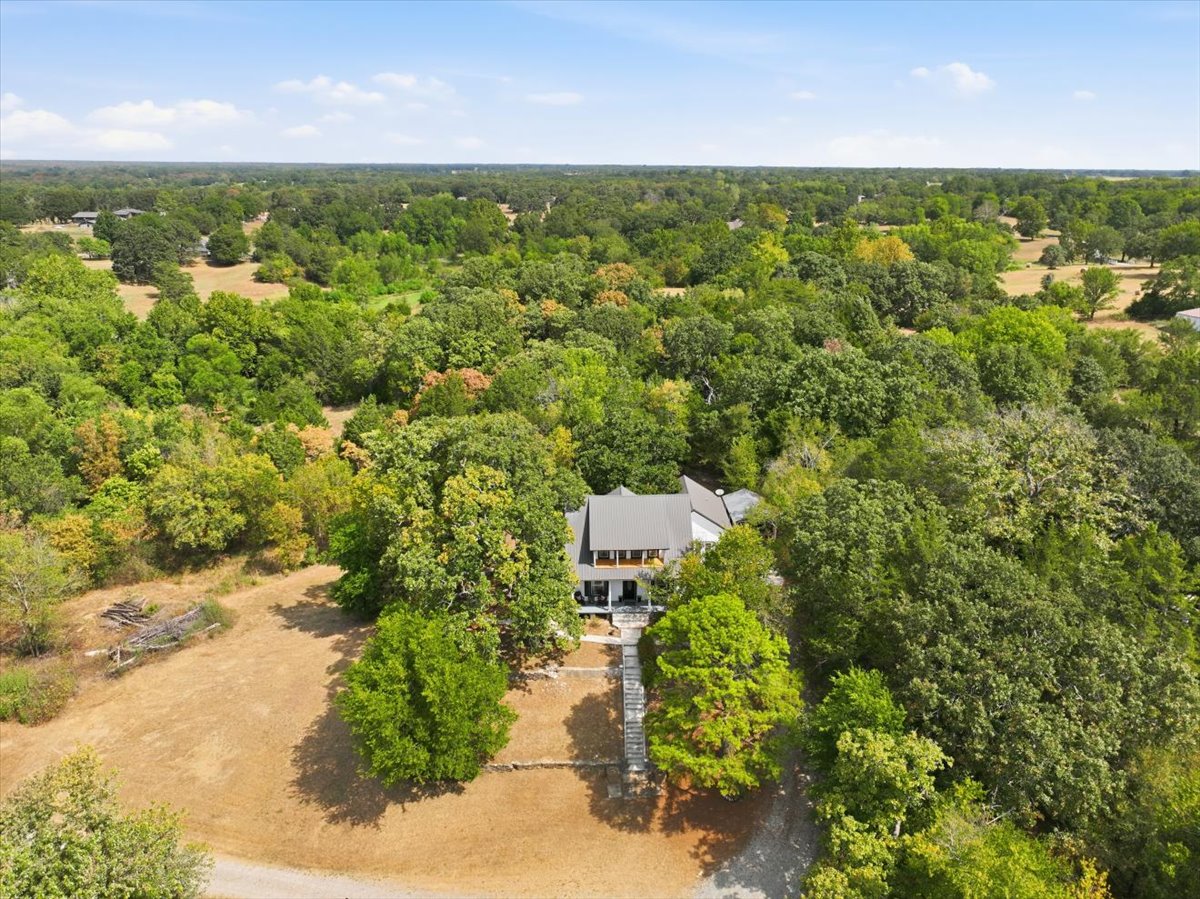 407 South 7 Springs Road Tishomingo, OK 73460 - Photo 34 of 45 Single-story residence set amidst abundant mature trees
