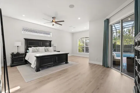 a bed room with a bed and a window