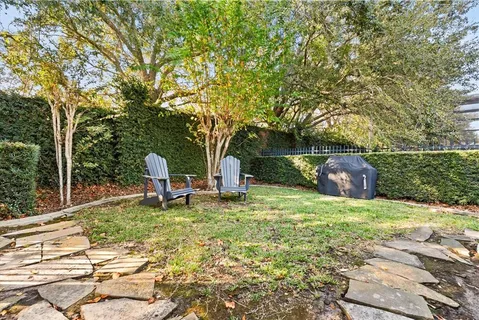 a backyard of a house with seating space