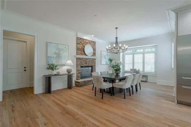 a large kitchen with granite countertop a sink and a stove top oven