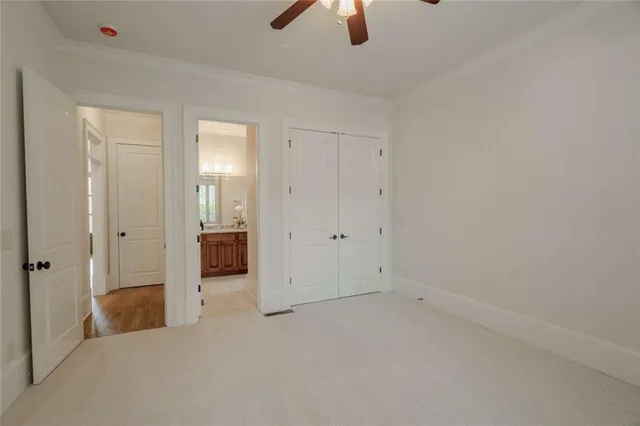 a living room with furniture a fireplace and a chandelier