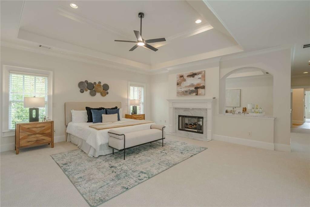1364 Manget Way Dunwoody, GA 30338 - Photo 24 of 66 a living room with furniture and a fireplace