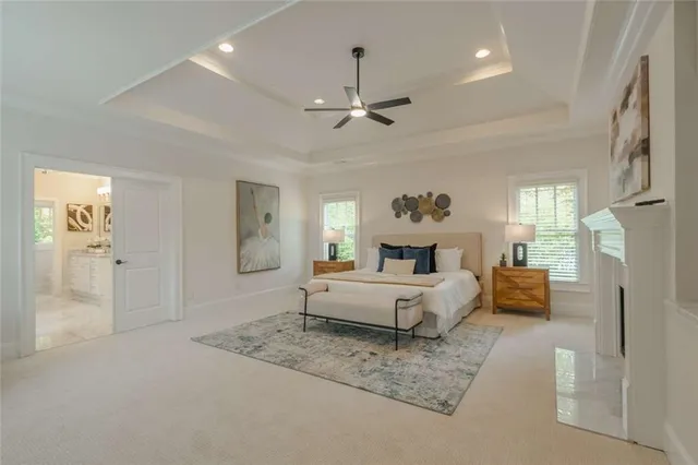 a bathroom with a sink a mirror and a shower