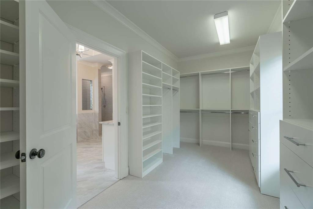 1364 Manget Way Dunwoody, GA 30338 - Photo 34 of 66 a view of an empty room and a bathroom