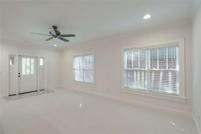 a aerial view of a house with a yard