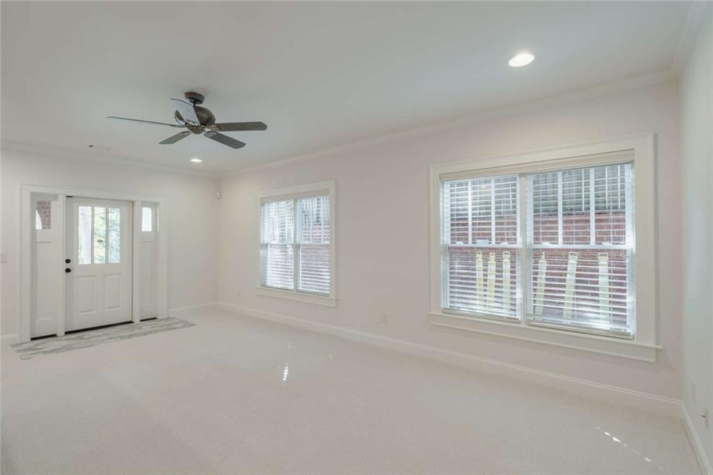 1364 Manget Way Dunwoody, GA 30338 - Photo 49 of 66 a view of an empty room with a window