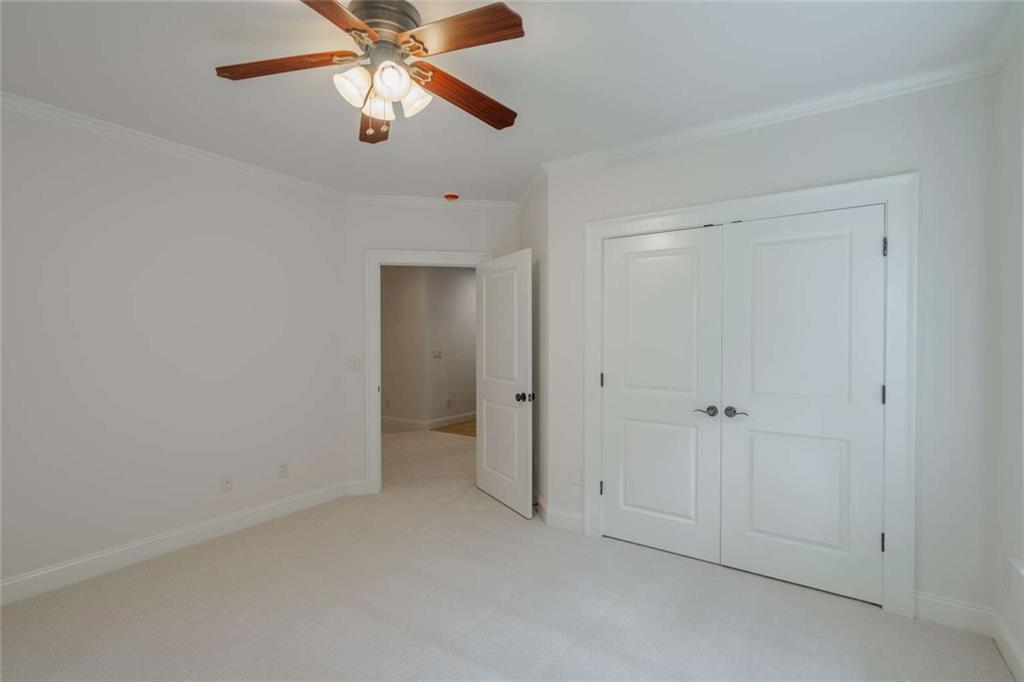 1364 Manget Way Dunwoody, GA 30338 - Photo 50 of 66 a view of an empty room and a ceiling fan