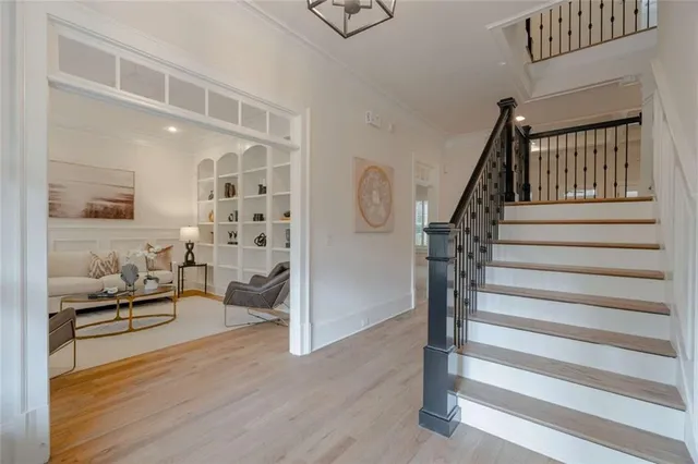a view of entryway with wooden floor