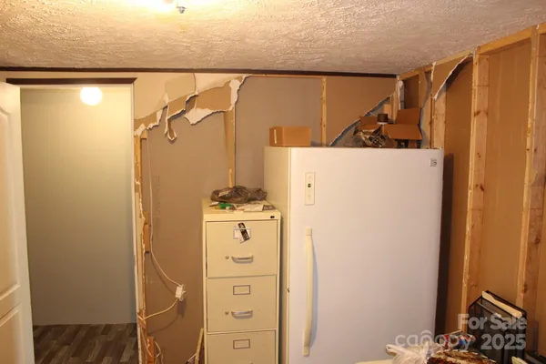 a bathroom with a shower and a sink