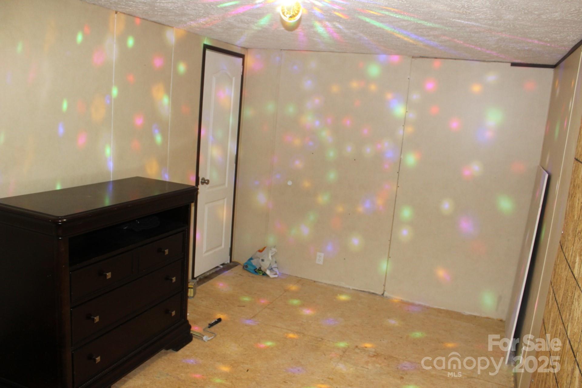 260 Buck Br Road Mill Spring, NC 28756 - Photo 6 of 32 a bathroom with a sink a vanity and a mirror
