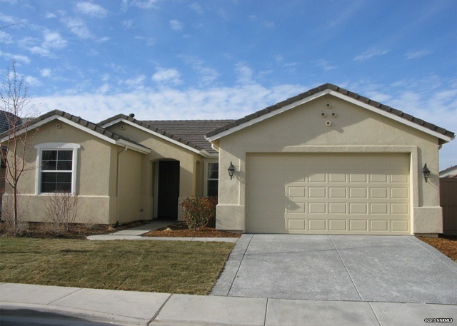 10623 Fort Morgan Way Reno, NV 89521 - Photo 1 of 1 a view of a house with a yard