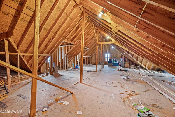 a picture of a kitchen with a refrigerator