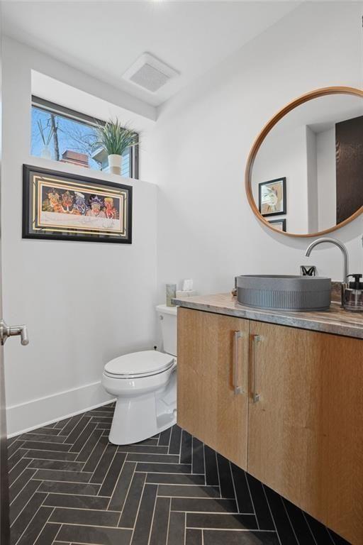 7207 Ridgeview Drive Jasper, GA 30143 - Photo 18 of 46 a bathroom with a toilet and a mirror