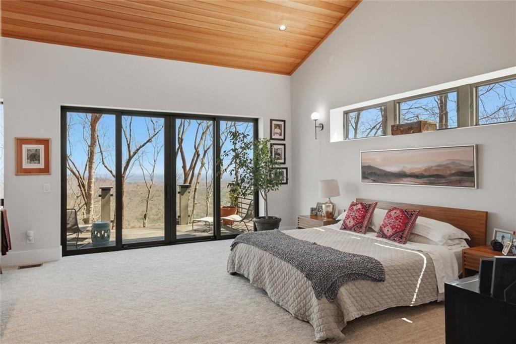 7207 Ridgeview Drive Jasper, GA 30143 - Photo 20 of 46 a bedroom with a large bed and a large window
