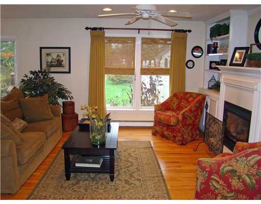 9 Columbia Road Middletown, RI 02842 - Photo 4 of 12 Den/Family/Great Room. Gas Fireplace & Hardwood Floors