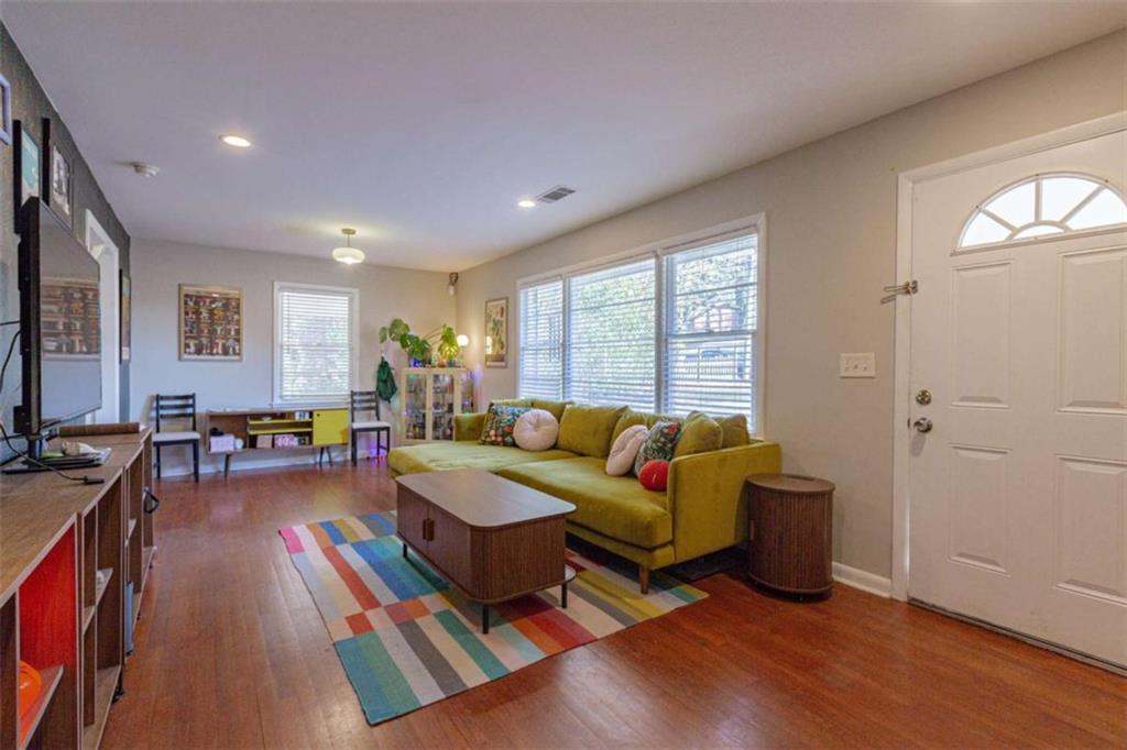 3592 Barrington Place Decatur, GA 30032 - Photo 11 of 32 a living room with furniture and a window