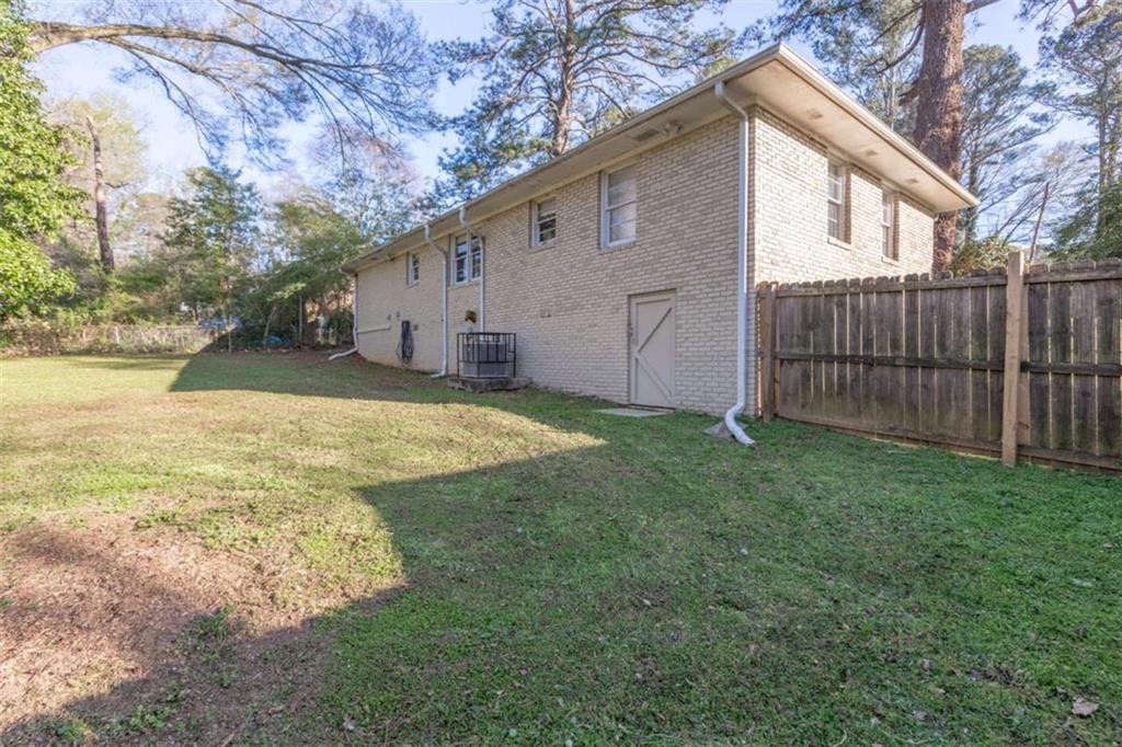 3592 Barrington Place Decatur, GA 30032 - Photo 27 of 32 a view of a backyard with a garden