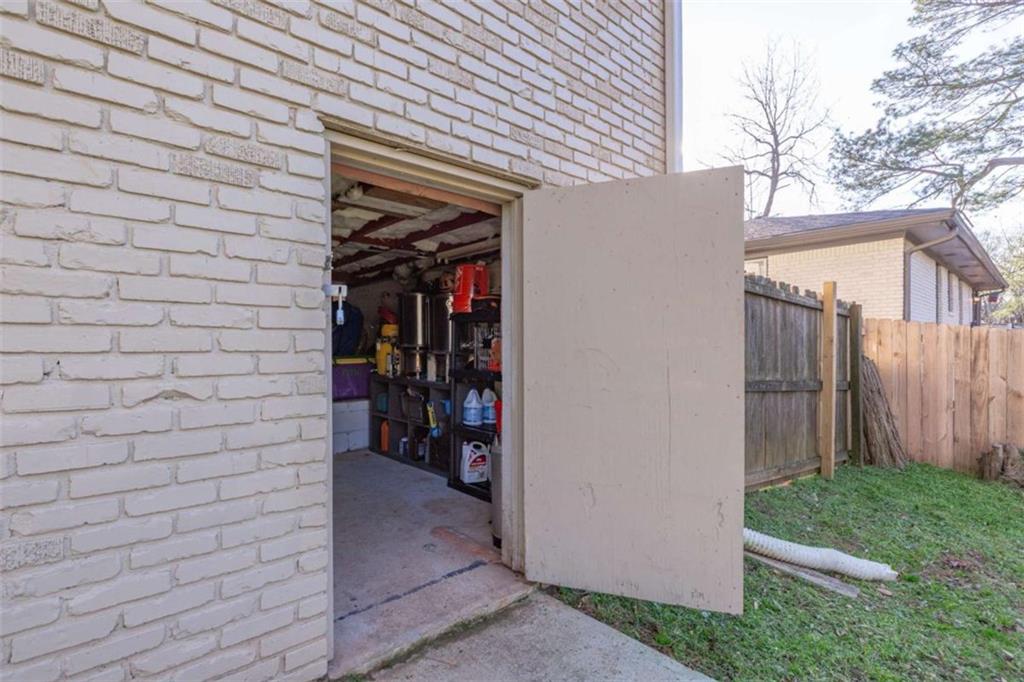 3592 Barrington Place Decatur, GA 30032 - Photo 28 of 32 a view of wooden door and brick wall