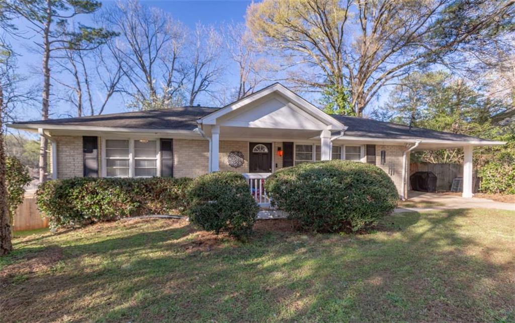 3592 Barrington Place Decatur, GA 30032 - Photo 7 of 32 front view of a house with a yard