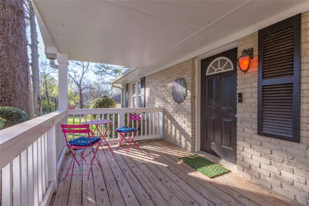3592 Barrington Place Decatur, GA 30032 - Photo 8 of 32 a balcony with wooden floor and outdoor seating