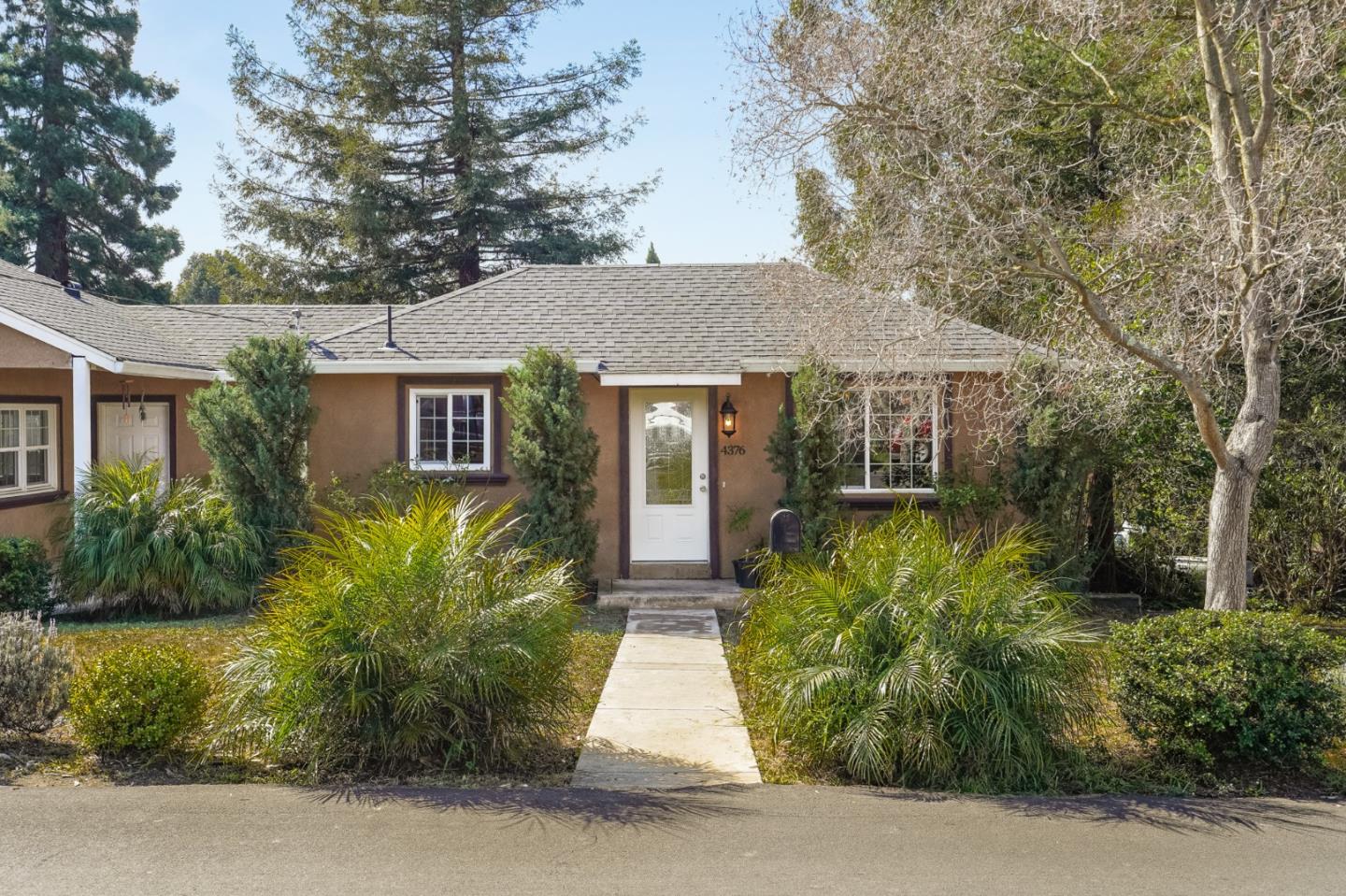 4376 Santa Rita Road El Sobrante, CA 94803 - Photo 1 of 48 a view of house with outdoor space garden and tree