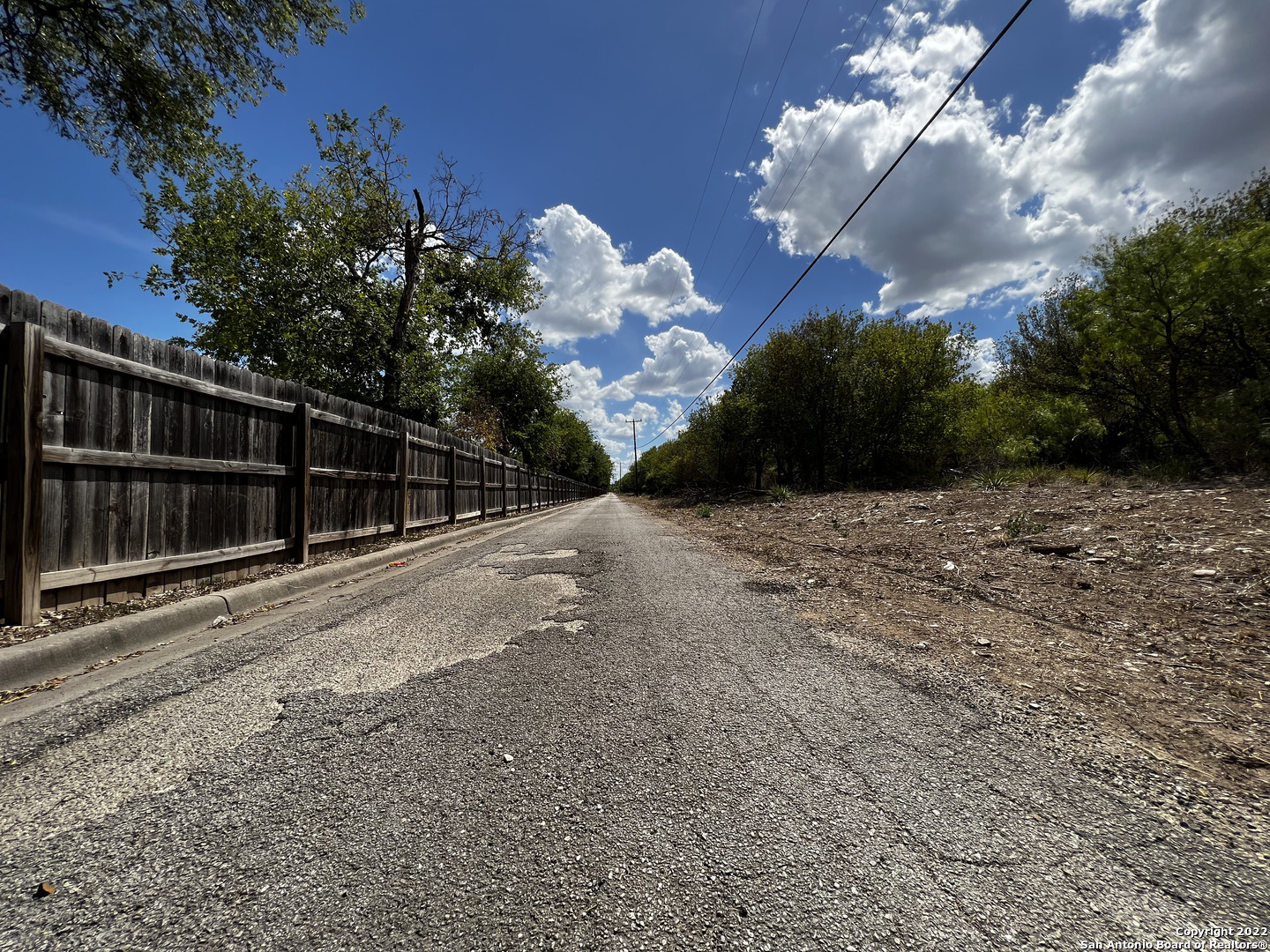 7915 Krueger Moore Road San Antonio, TX 78250 - Photo 6 of 9 a view of a backyard of a house