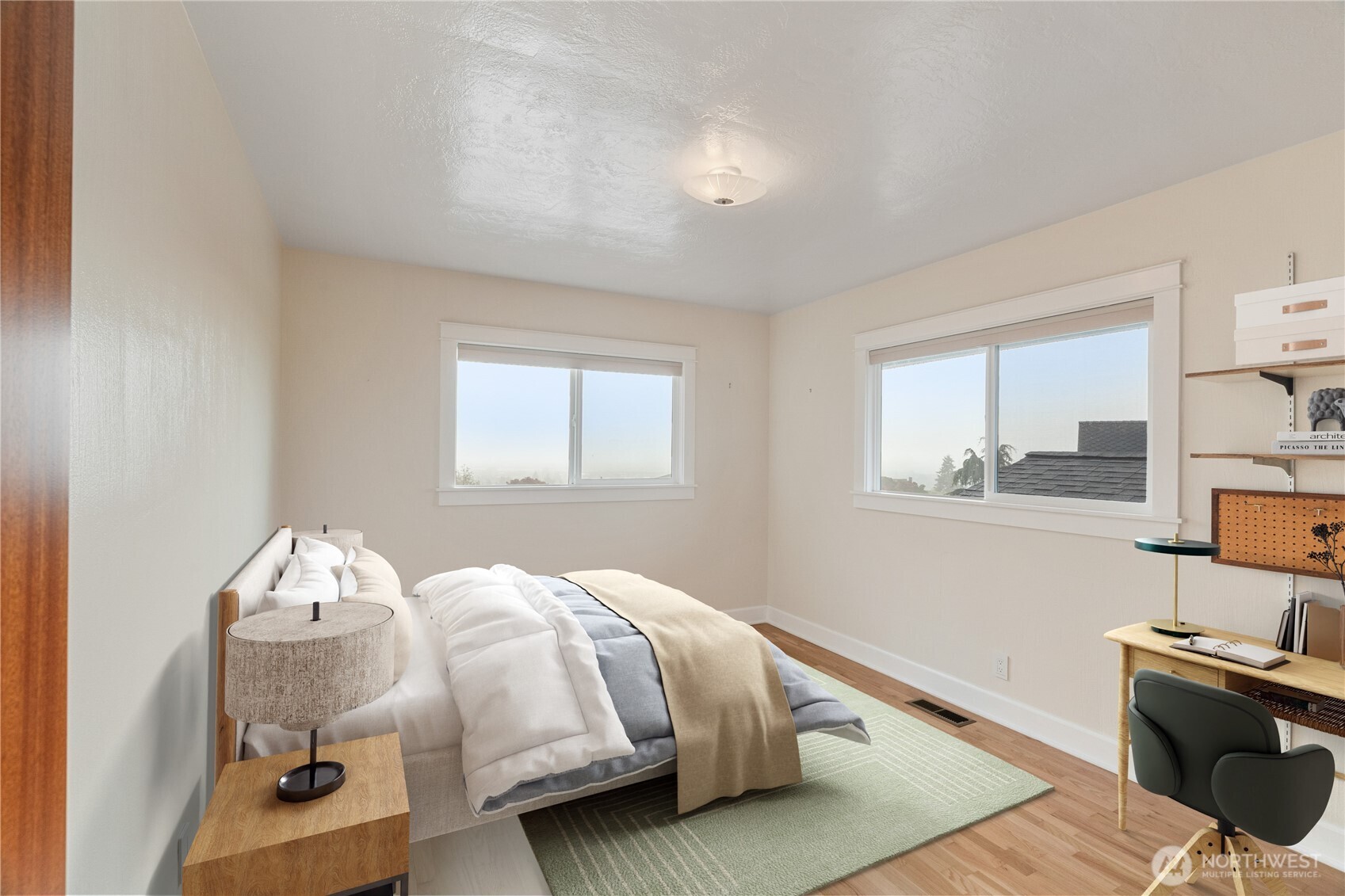 1233 Chilton Road Aberdeen, WA 98520 - Photo 15 of 40 a bedroom with a bed and window