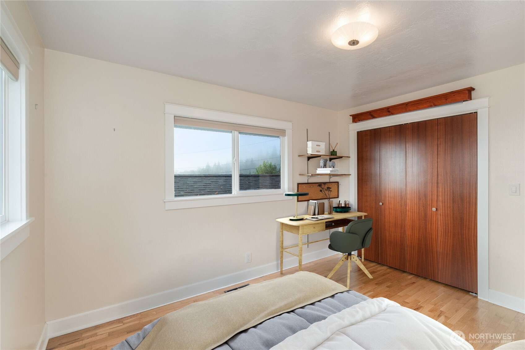 1233 Chilton Road Aberdeen, WA 98520 - Photo 16 of 40 a bedroom with a bed and a window