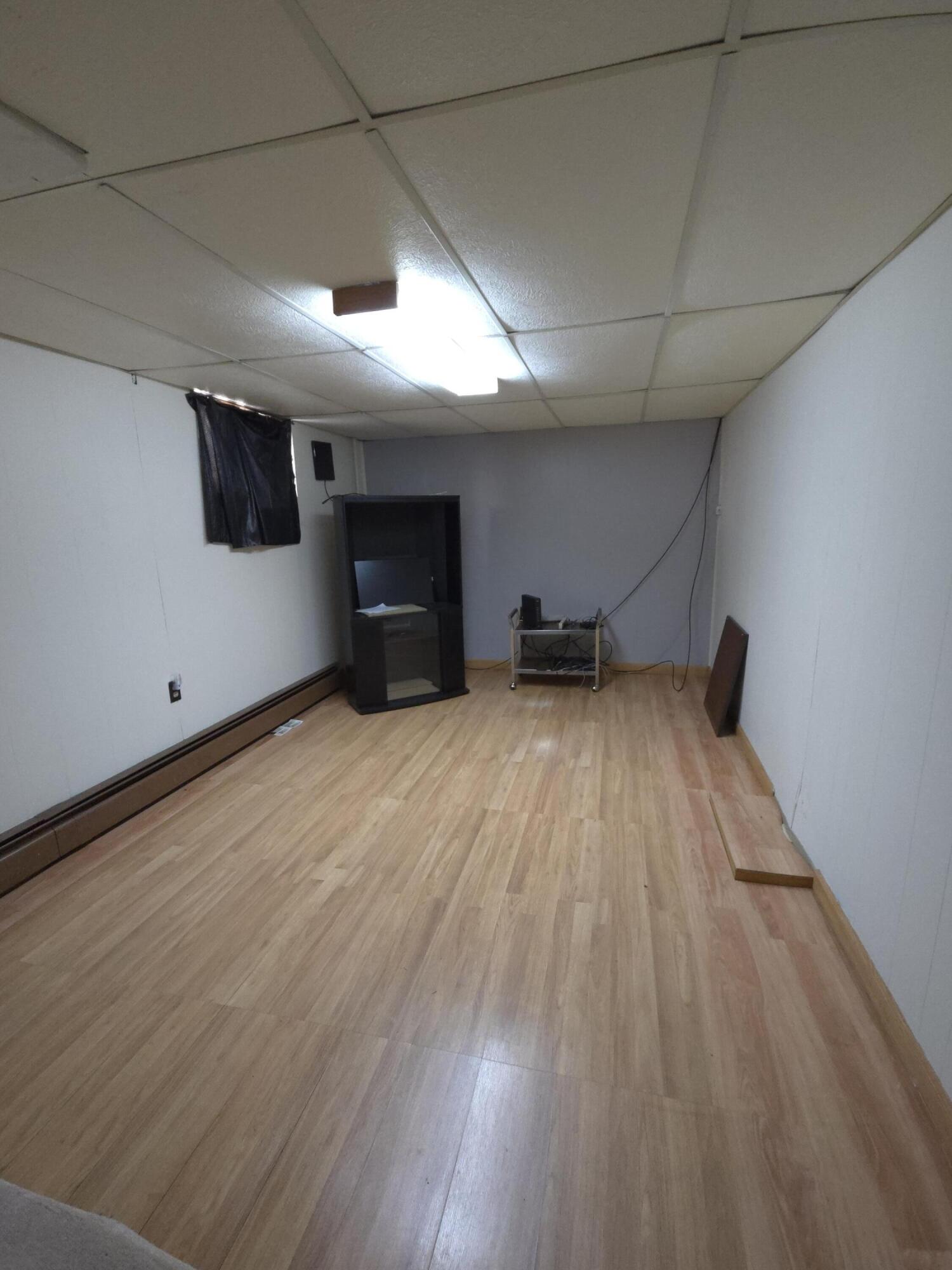 764 Hanley Street Gary, IN 46406 - Photo 11 of 15 a view of empty room with wooden floor