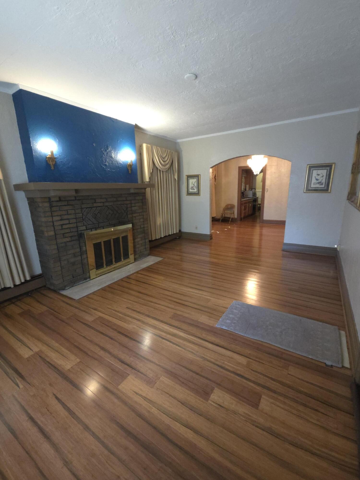 764 Hanley Street Gary, IN 46406 - Photo 2 of 15 a view of empty room with wooden floor