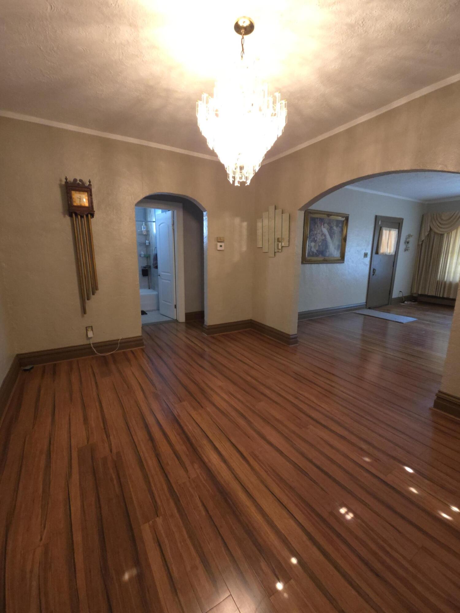 764 Hanley Street Gary, IN 46406 - Photo 4 of 15 a view of a room with wooden floor