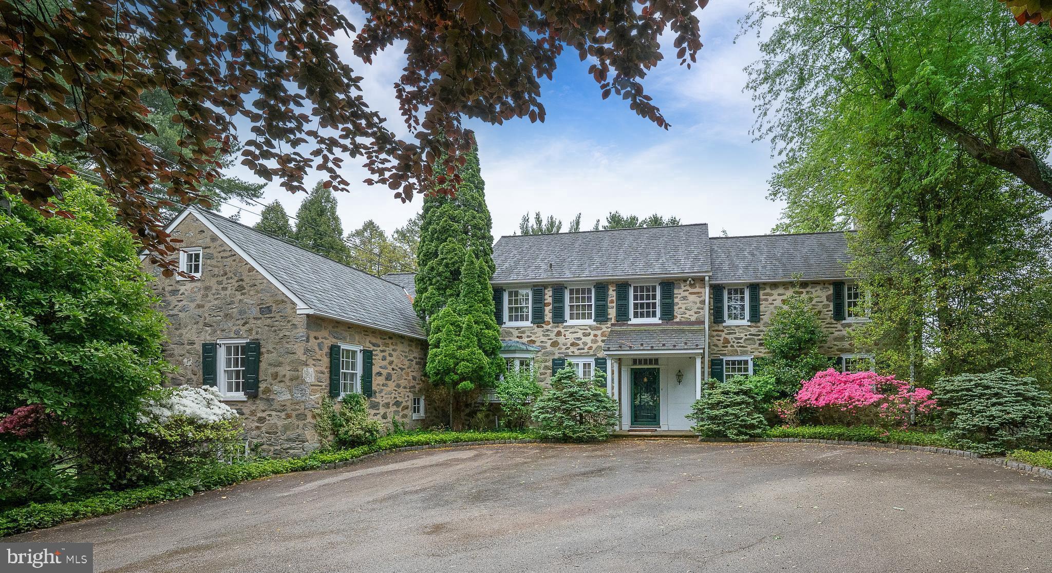 a front view of a house with a garage