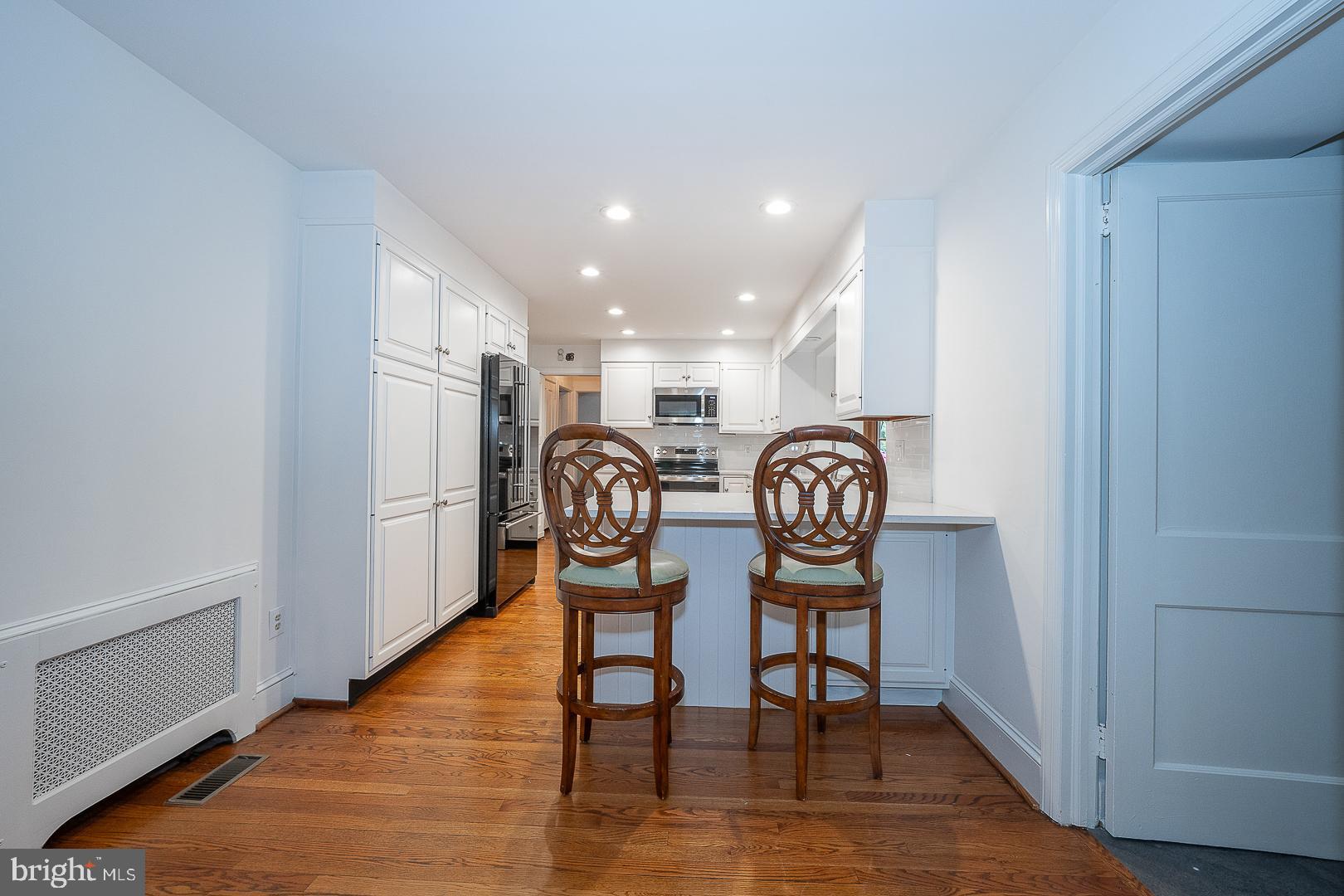 55 Wistar Road Villanova, PA 19085 - Photo 16 of 51 a view of a dining room with furniture and wooden floor