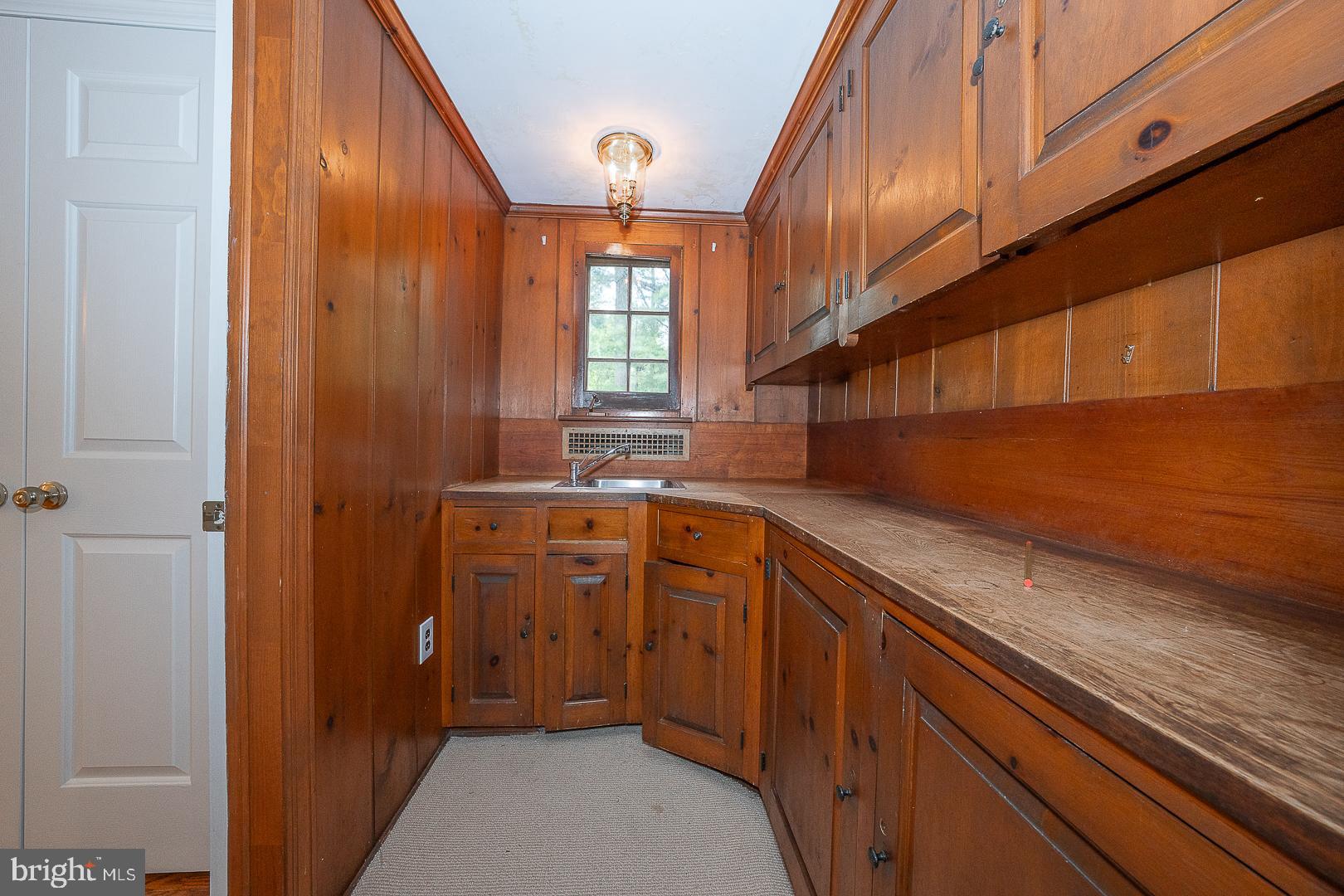 55 Wistar Road Villanova, PA 19085 - Photo 19 of 51 a kitchen with sink a cabinets and window