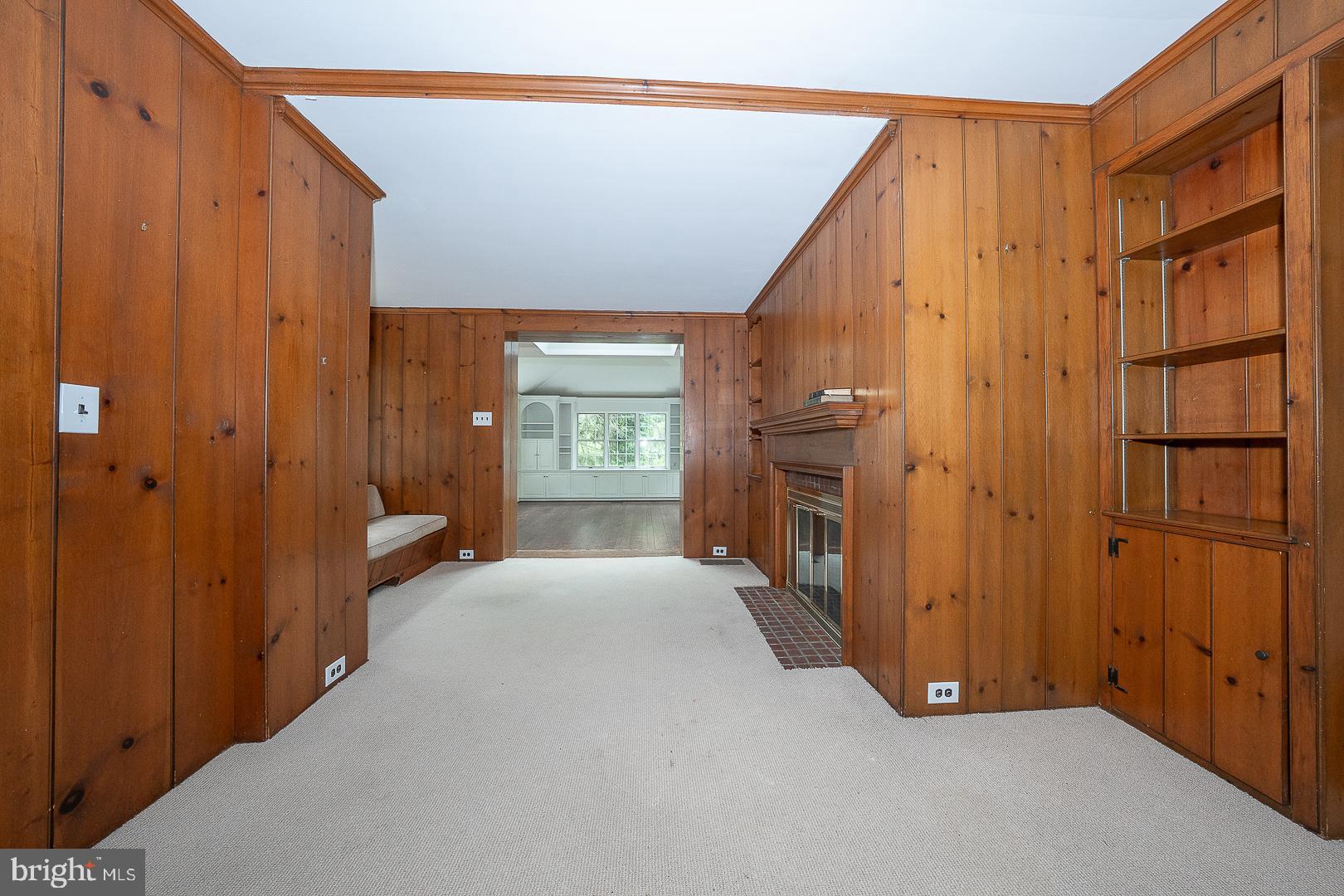 55 Wistar Road Villanova, PA 19085 - Photo 26 of 51 a view of an empty room with a fireplace and a window