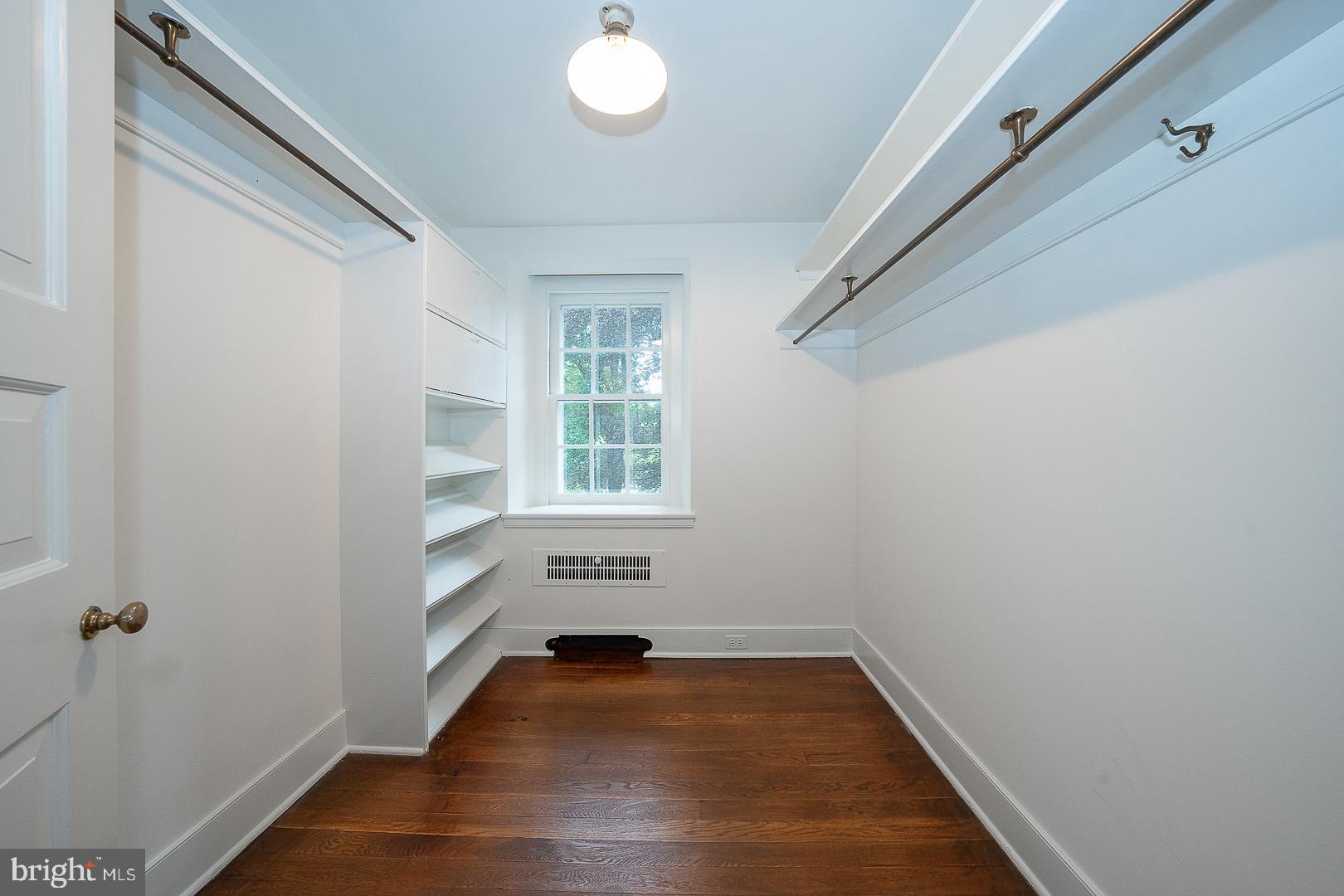 55 Wistar Road Villanova, PA 19085 - Photo 34 of 51 a view of an empty room with wooden floor and a window