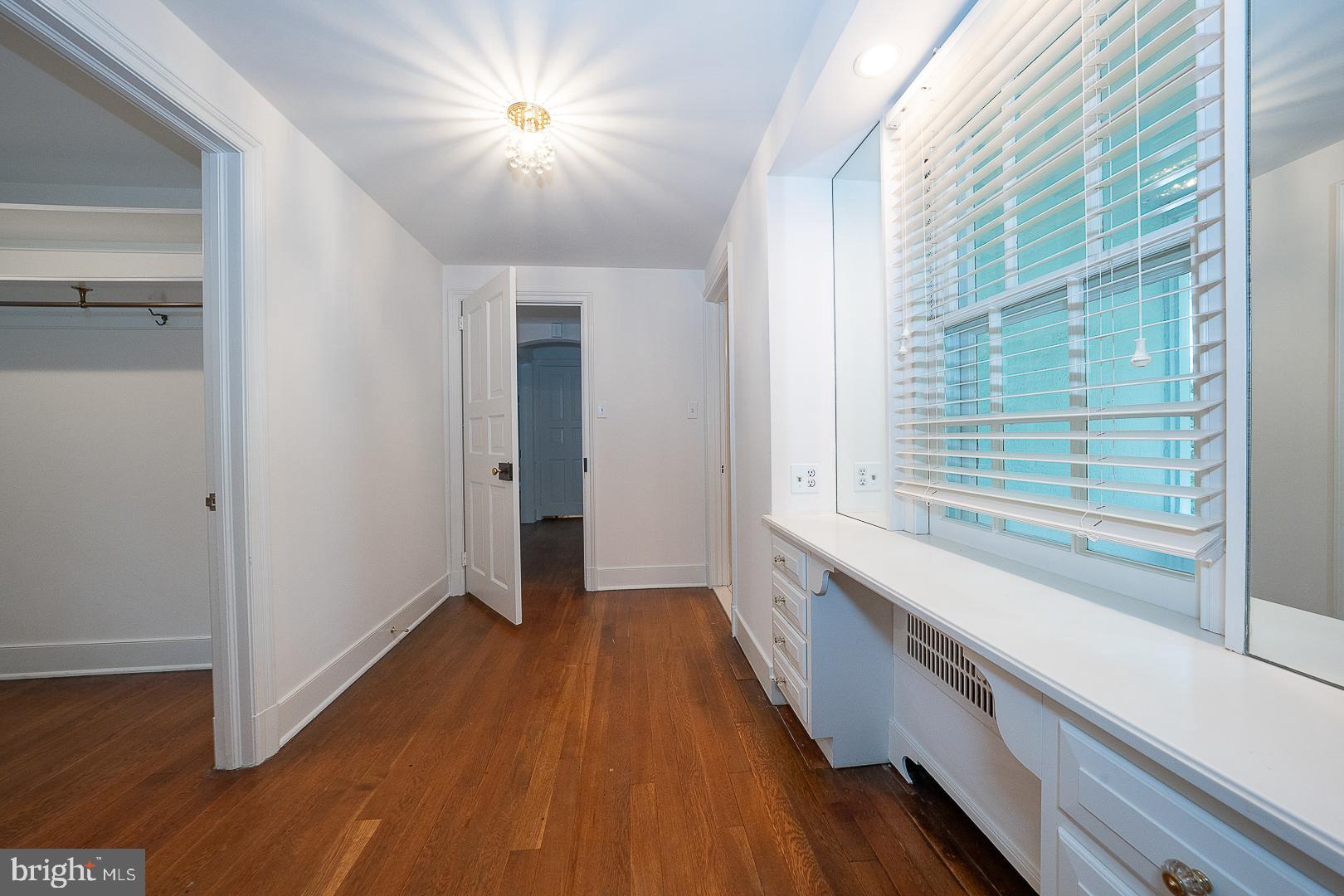 55 Wistar Road Villanova, PA 19085 - Photo 38 of 51 a view of hallway with wooden floor and fan