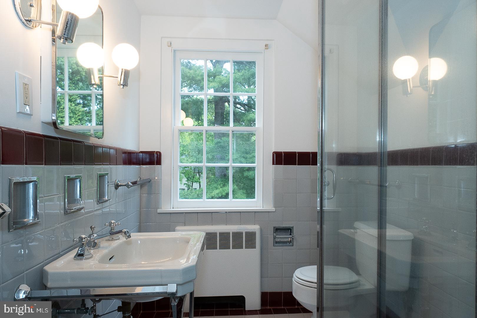 55 Wistar Road Villanova, PA 19085 - Photo 46 of 51 a bathroom with a sink and a mirror