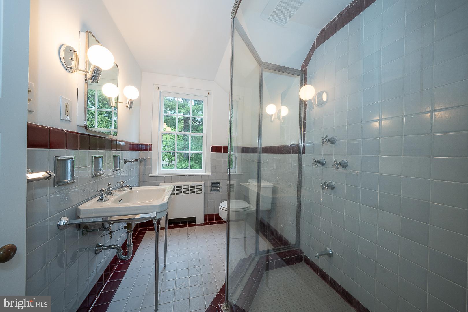 55 Wistar Road Villanova, PA 19085 - Photo 47 of 51 a bathroom with a sink a vanity and a mirror