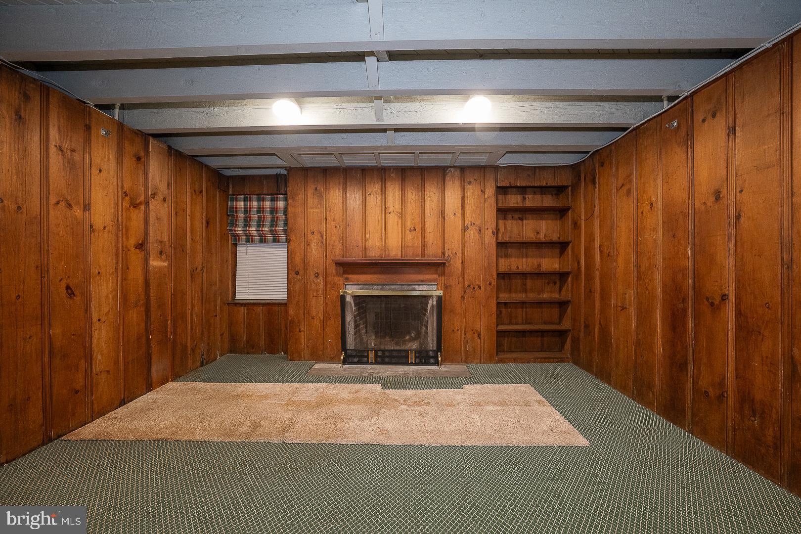 55 Wistar Road Villanova, PA 19085 - Photo 48 of 51 a room with a bed and a fireplace