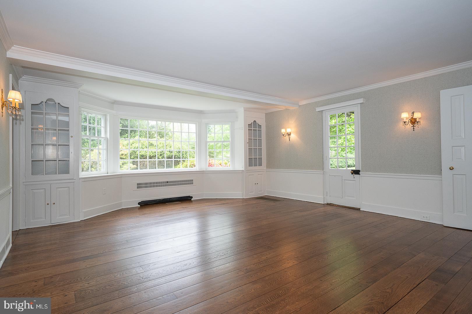 55 Wistar Road Villanova, PA 19085 - Photo 10 of 51 an empty room with wooden floor and windows