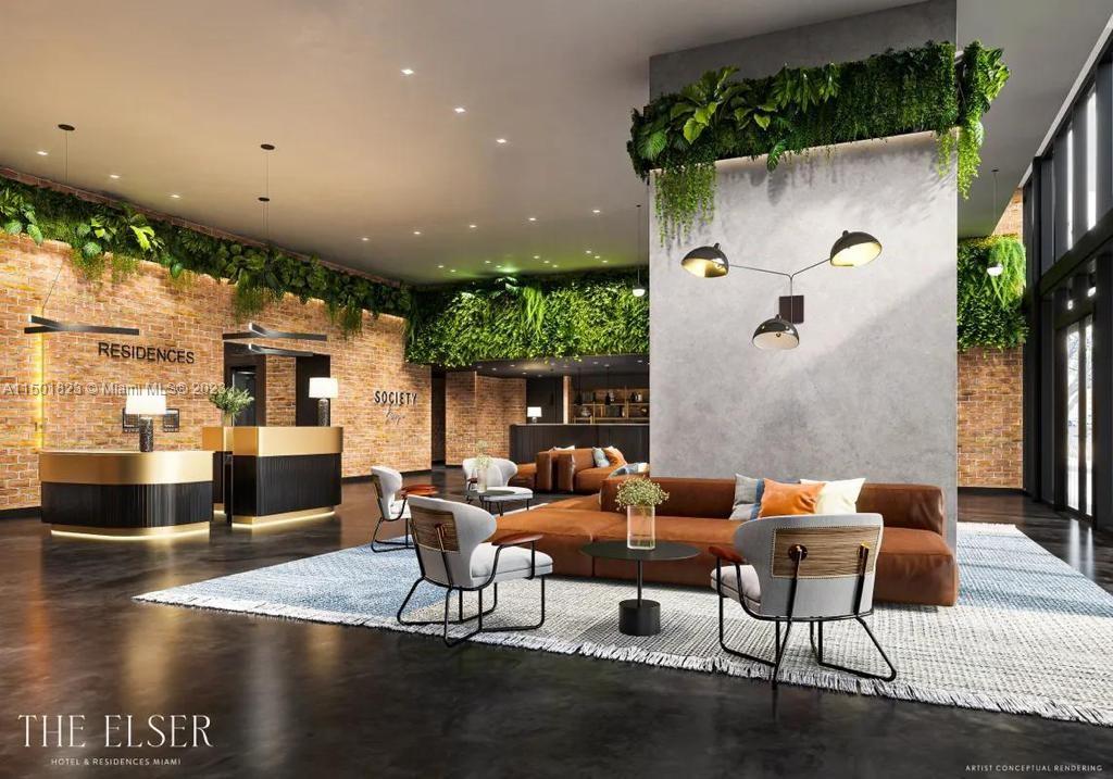 398 Northeast 5th Street, Unit 2804 Miami, FL 33132 - Photo 8 of 17 a living room with furniture and a wooden floor