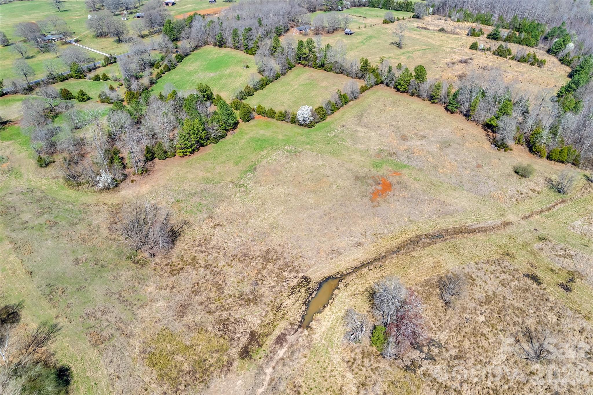 2548 Gordon Road Rock Hill, SC 29732 - Photo 9 of 19 a view of lot of white house with green space