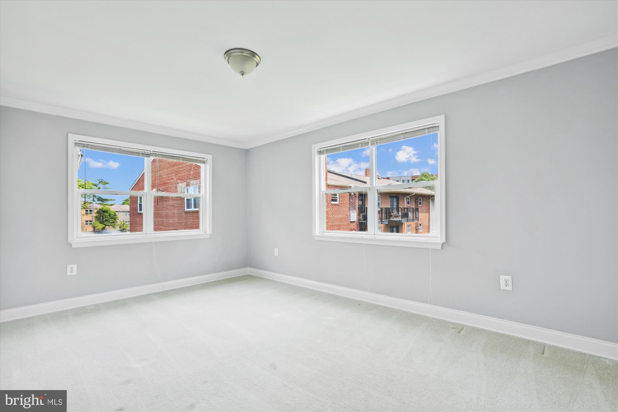 5909 Quantrell Avenue, Unit 203 Alexandria, VA 22312 - Photo 13 of 33 an empty room with windows