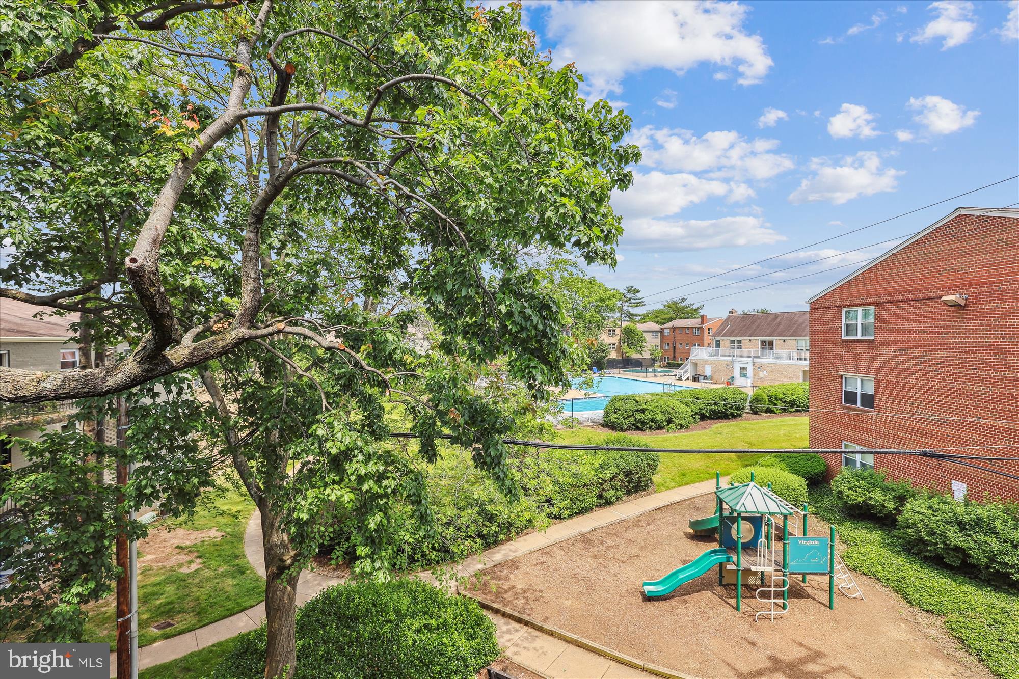 5909 Quantrell Avenue, Unit 203 Alexandria, VA 22312 - Photo 21 of 33 a view of a yard with an outdoor seating